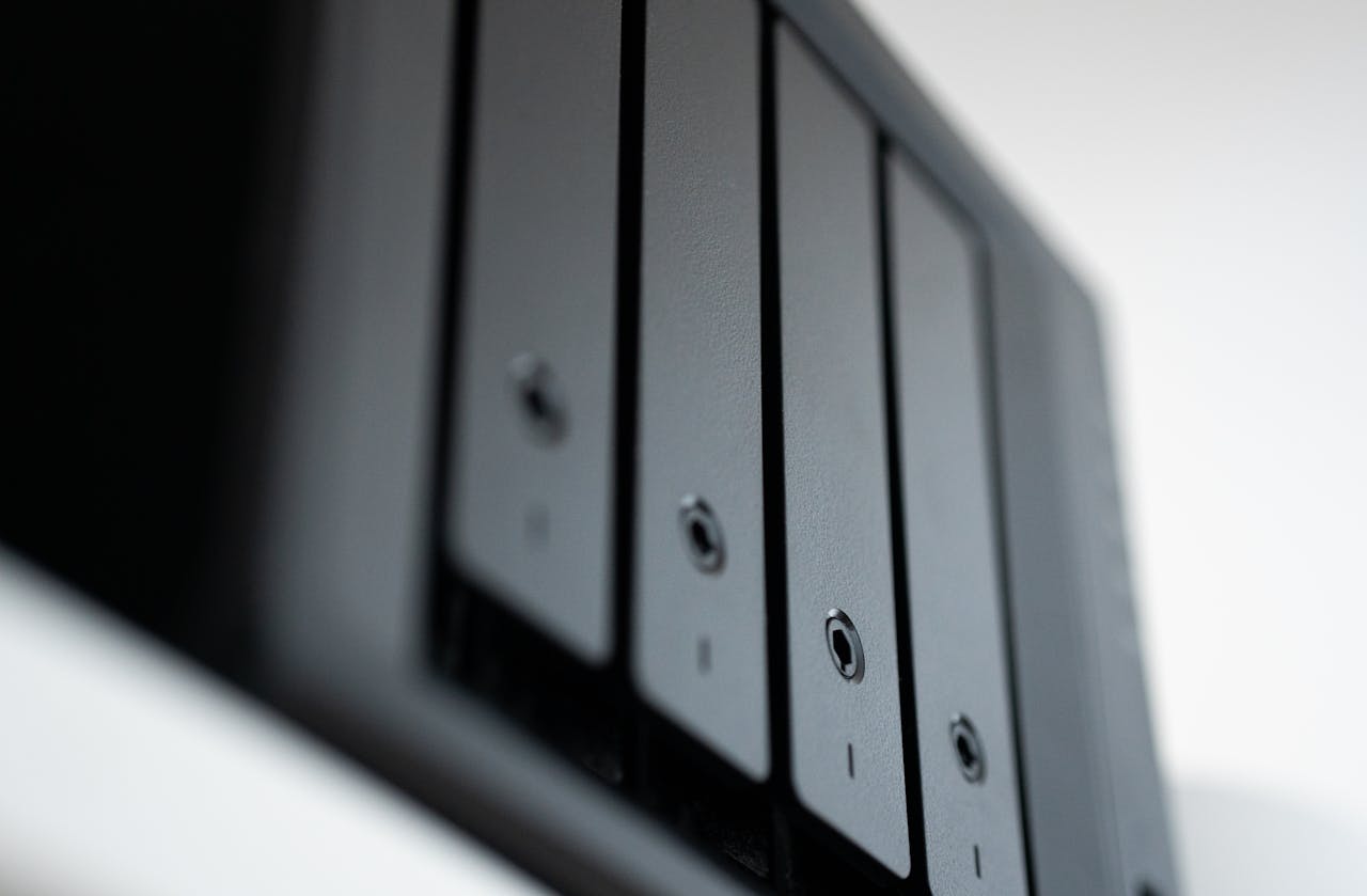 cta-bg Detailed view of a black data storage unit highlighting modern technology and data management.